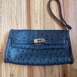 Sophisticated Dark grey Ostrich Texture Clutch with Gold Hardware